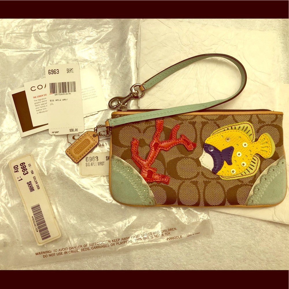 Coach limited edition fish signature wristlet